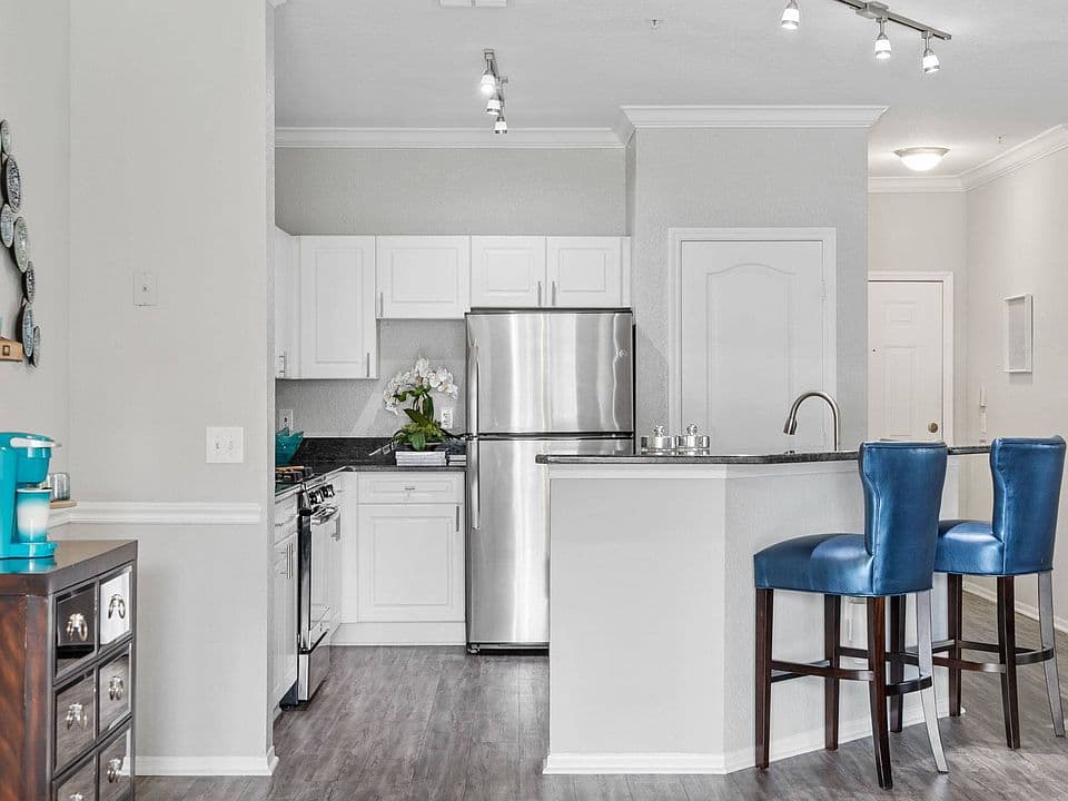 A kitchen breakfast bar in a North Path home