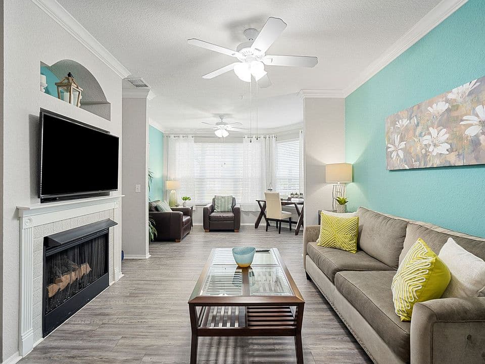 A bright, furnished living room in a North Path home